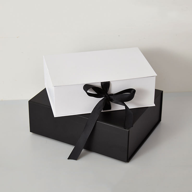 Rigid paperboard dress gift box interior