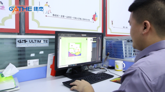 Packaging design workstation with artwork on screen